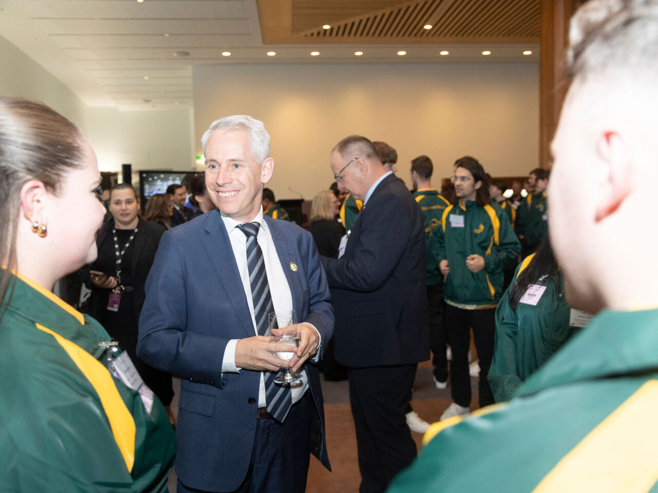Members of the WorldSkills 2026 Team Australia training squad talking with officials at Parliament House in Australia.