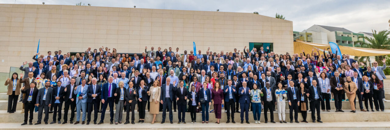 A group shot of over 300 people standing seven rows who convened in Dubrovnik from 12 to 17 October 2025 for WorldSkills General Assembly 2025.