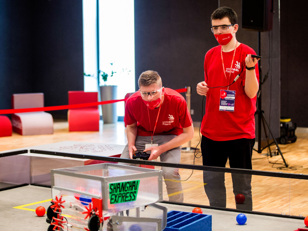 Two&nbsp;mobile robotics competitors at the National Competition in Lublin 2021.
