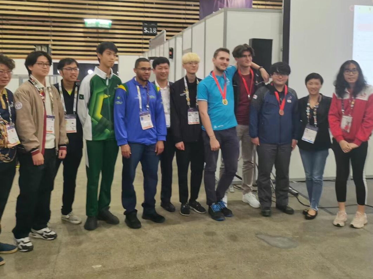 A group of competitors standing in a row at WorldSkills Lyon 2024.&nbsp;
