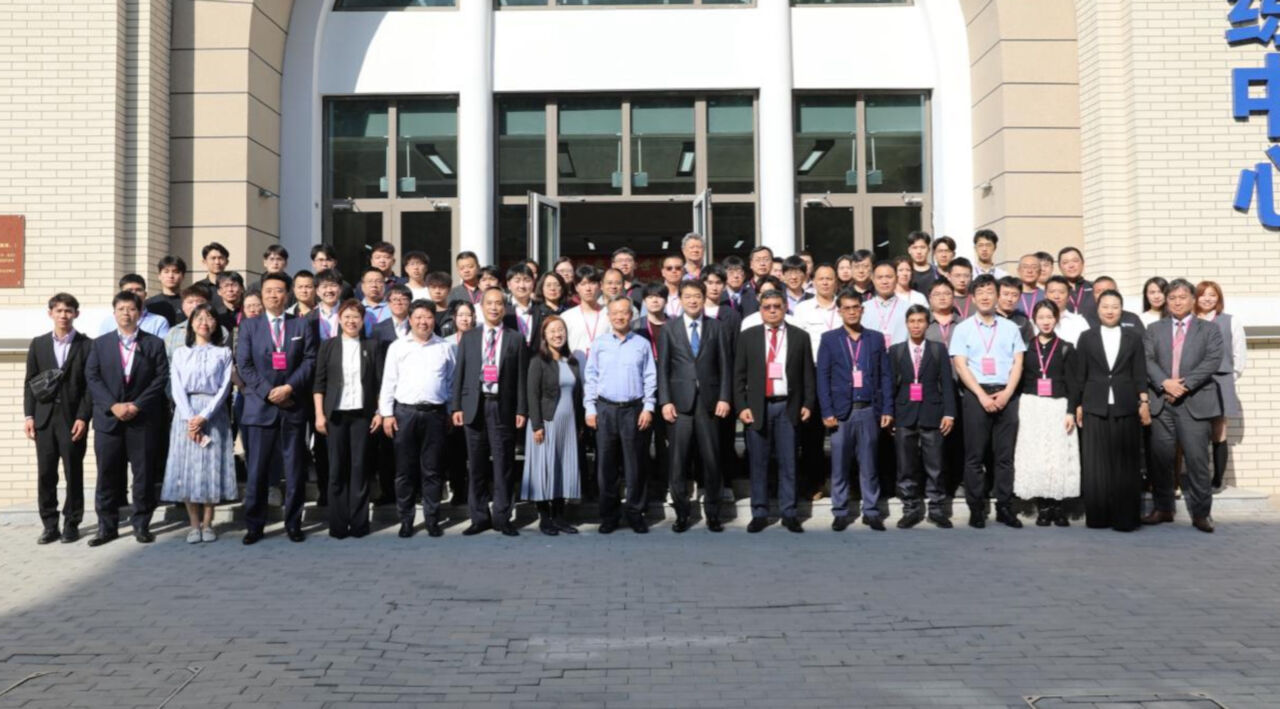 People gather outside for the launch of the Global Training Center’s Information Network Cabling Training Base located in Tianjin, China.